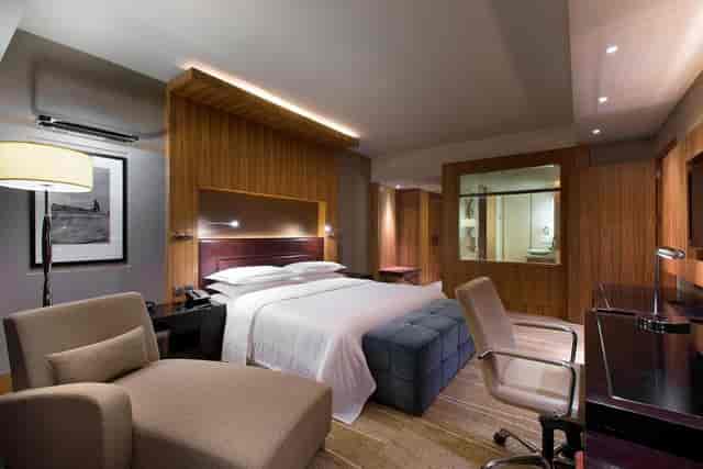 Sheraton Grand Bangalore suite with modern furnishings, ideal for conferences and events.