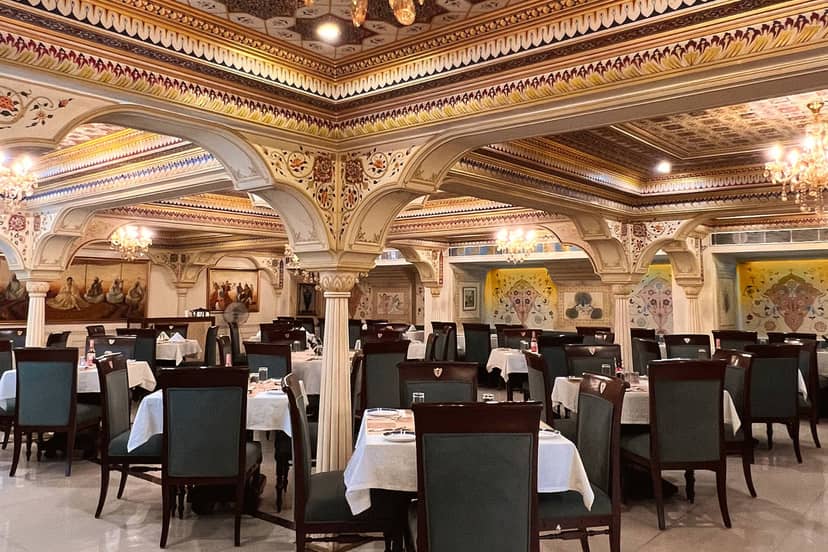 Elegant Tandoor Restaurant banquet hall with ornate decor, ideal for events and gatherings.