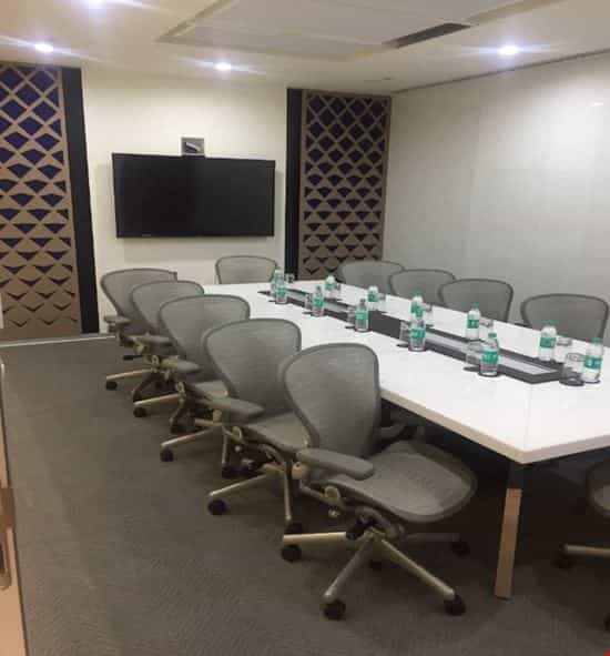 Modern conference room in Bangalore with large table, ideal for corporate events