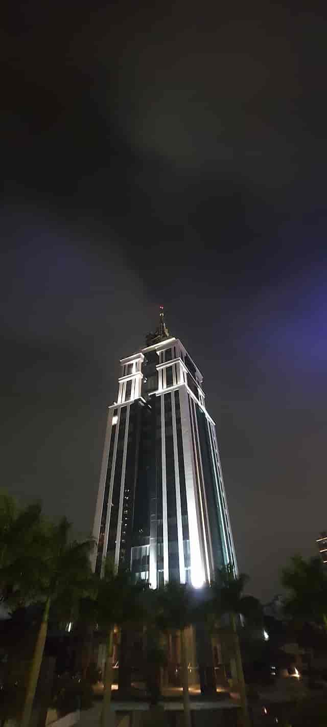 Illuminated skyscraper in The Executive Centre, ideal for corporate events in Bangalore.