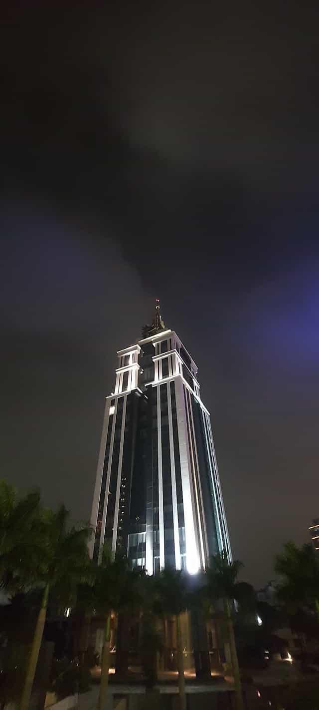 Illuminated skyscraper in The Executive Centre, ideal for corporate events in Bangalore.