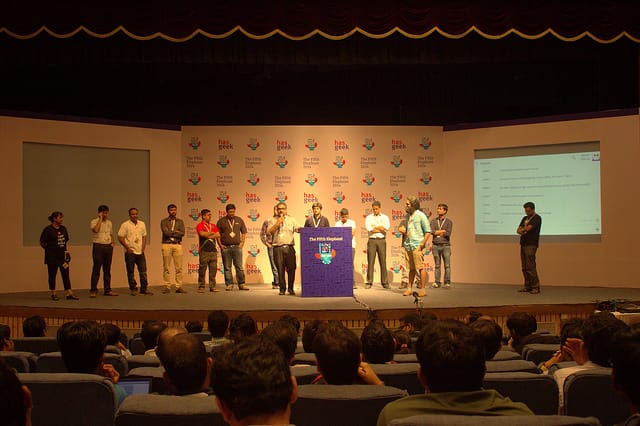 "Auditorium 3 panel discussion with engaged audience at The Fifth Elephant event"
