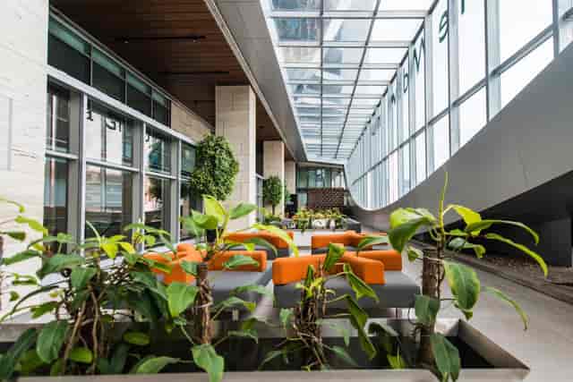 Modern event space with natural light, ideal for meetings and networking events.