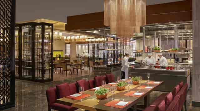 Sophisticated dining area in b Café, ideal for corporate dinners and private events.