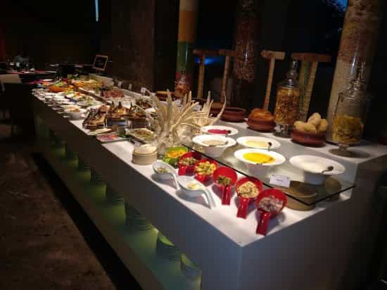 Well-curated buffet at Nook, Aloft Bengaluru for corporate events and networking.
