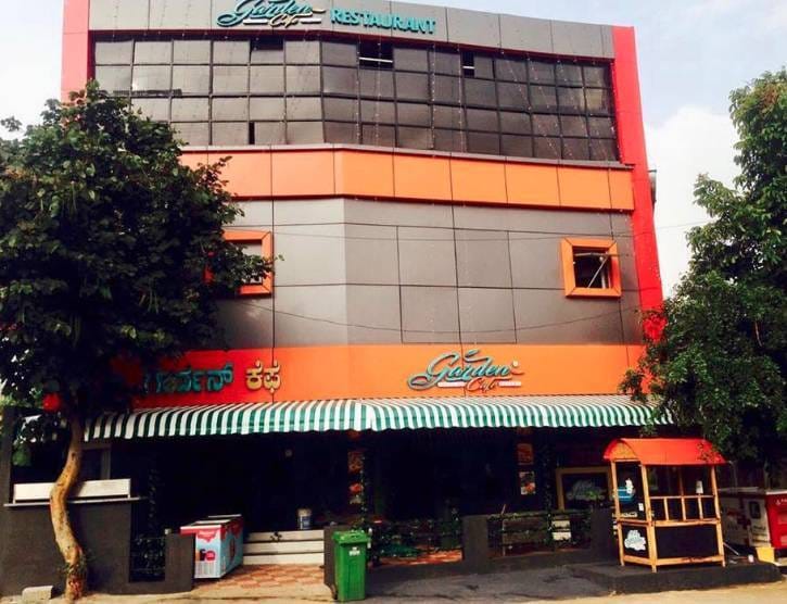 Garden Cafe Restaurant - vibrant venue with striped awning for events and gatherings