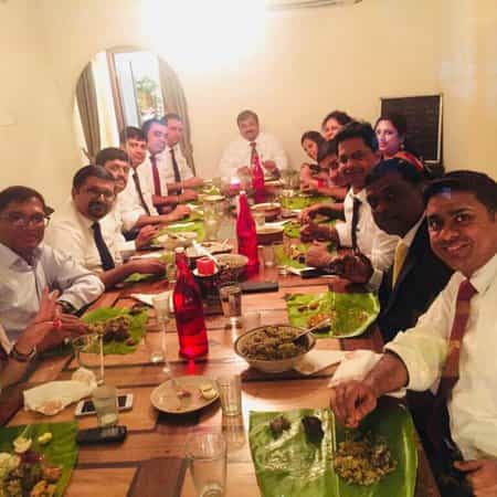 Group gathering at Bengaluru's Oota Company for corporate retreats and team-building events.