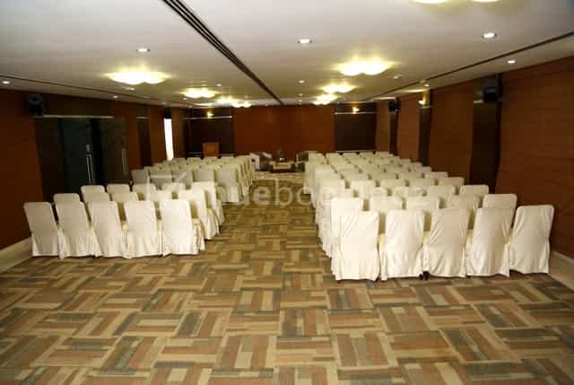 Event space at The Verda Saffron, featuring organized chairs for meetings and presentations.
