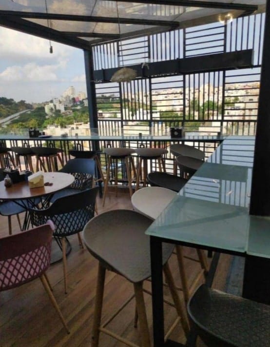 Outdoor seating at The Relish Lounge: modern design for networking events and casual meetings.