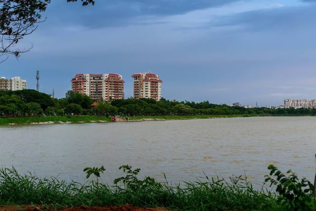 Serene lakeside dining area for outdoor events and team-building activities.