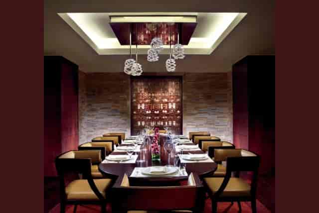 Elegant private dining room with sophisticated decor for exclusive meetings and events.