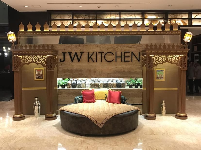 JW Kitchen reception at JW Marriott Bengaluru with elegant decor for dining events.