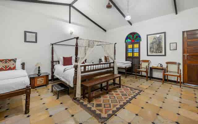Elegant guest room at Athitishala, ideal for retreats and small meetings.