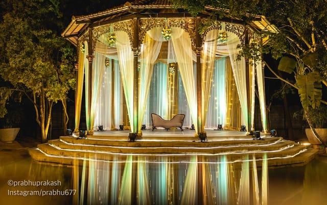 Elegant gazebo in outdoor conference hall for weddings or intimate gatherings.