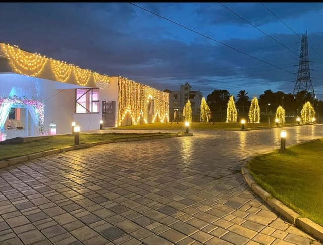 Bliss Convention Centre Lawn with string lights, perfect for evening weddings and events.