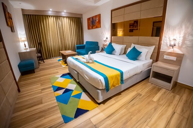 Modern hotel room in Arcadia Hotel, perfect for retreat-style meetings and events.