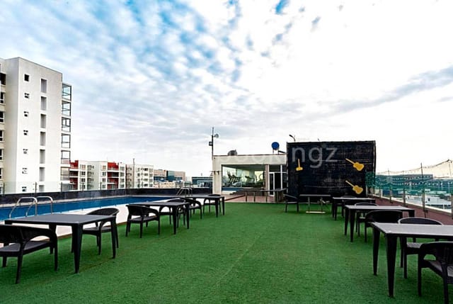 Rooftop Event Space at The Waverly Hotel with skyline view, ideal for receptions and networking.