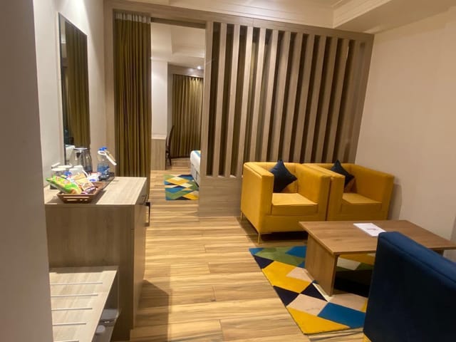 Modern Arcadia Hotel Board Room with vibrant yellow chairs for meetings and events.