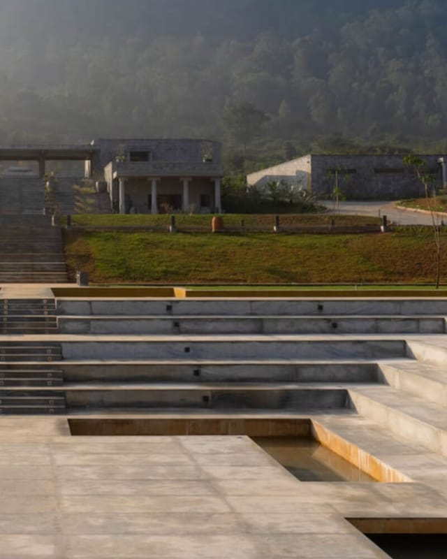Outdoor event venue with tiered seating, ideal for meetings and presentations.