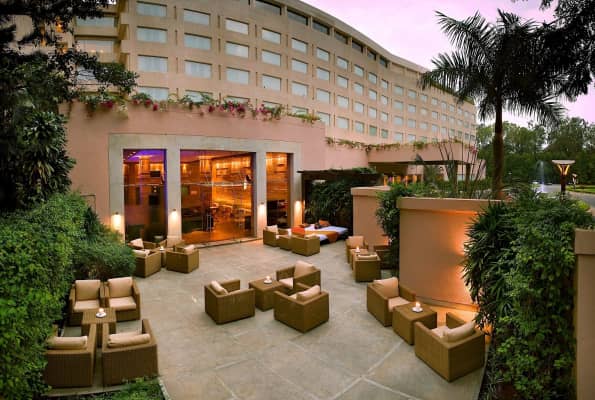 Outdoor lounge at The LaLiT Ashok Bangalore, ideal for networking events and meetings.