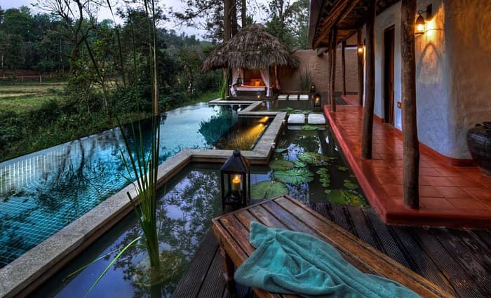 Serene outdoor event space at Palace Suites with inviting pool for retreats and meetings.
