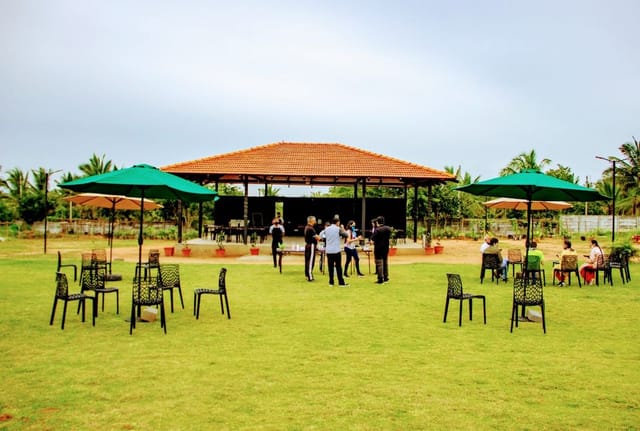 Garden Villas outdoor event space with covered stage, perfect for weddings and retreats.
