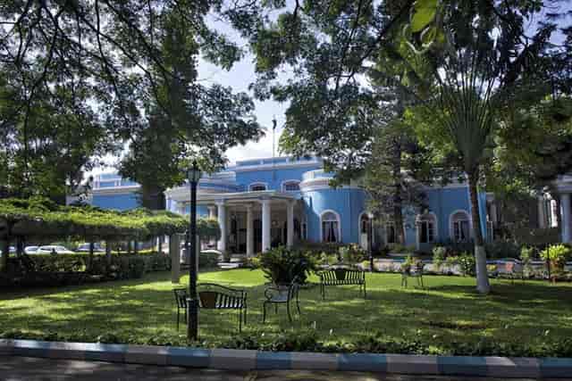 Brig. Hill Terrace, Bangalore Club: Elegant venue with blue facade for outdoor events.