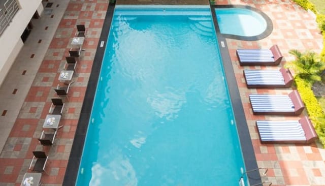 Outdoor pool at Sterling Yelagiri, perfect for events and relaxation gatherings.