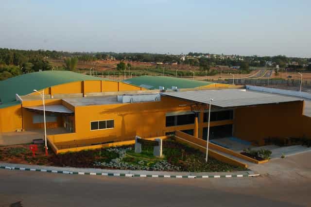Jacaranda at Bangalore Exhibition Centre, vibrant yellow architecture for events and gatherings.