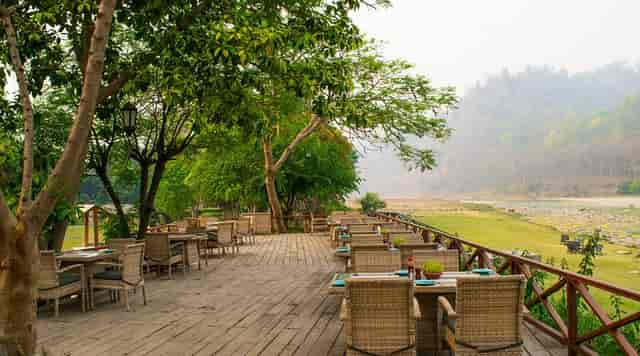 Outdoor dining area on The Kosi Deck, perfect for events and corporate retreats.