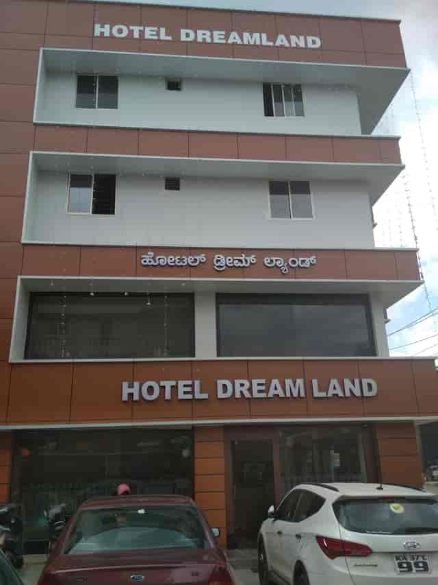 Hotel Dream Land façade, modern design ideal for corporate retreats and gatherings.