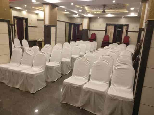 Mini Party Hall at Cospolitan Club, elegant chair covers for meetings and conferences.