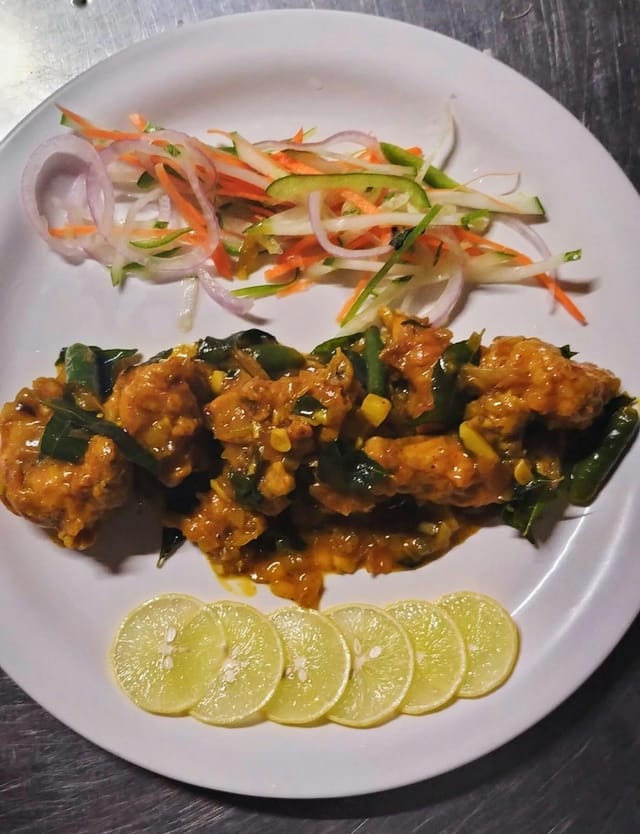 Appetizing meat dish in Royal Suite, Hill View Resorts for banquet catering events.