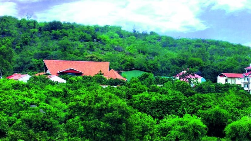 Royal Suite at Hill View Resorts with lush hills, perfect for retreats and meetings.