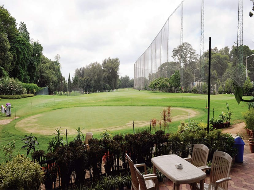 Scenic Bangalore Golf Club course with lush greenery for corporate events and team-building.