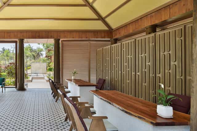 Modern meeting space with elegant wood accents at Mulberry Shades Bengaluru, ideal for events.