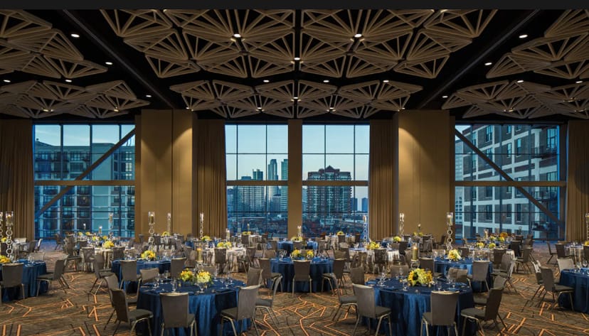 Grand Horizon Ballroom with skyline view, ideal for weddings and corporate events.
