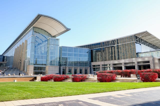 Modern glass-facade West Building at McCormick Place, perfect for conferences and events.