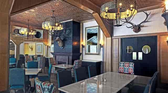 Stylish rustic event space at Fine Dine Restaurant, perfect for gatherings and workshops.