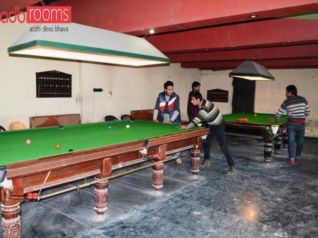 Cozy recreational area with billiard tables for team-building events at Hotel Silver Star.