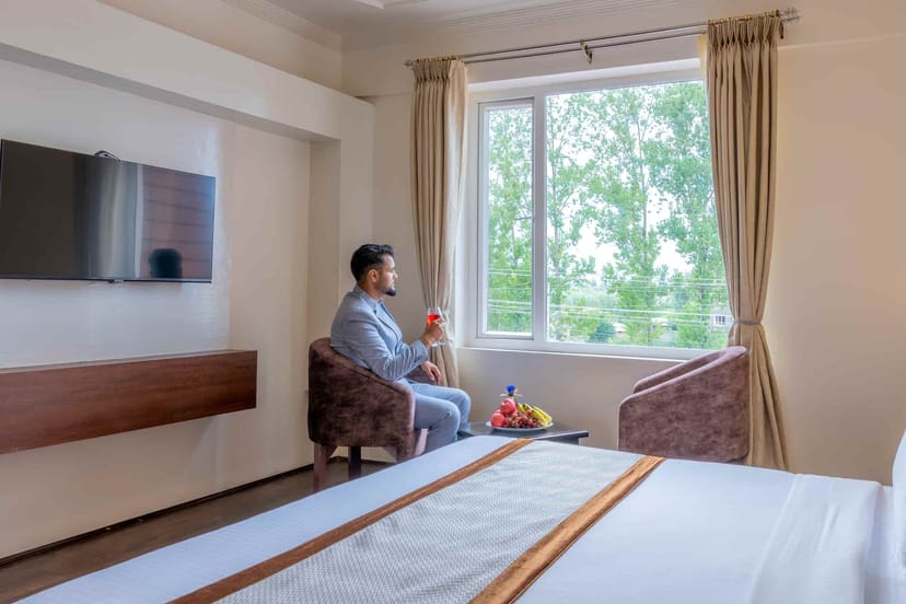 Event space in Crown Prince Hotel with modern furnishings, ideal for meetings and relaxation.