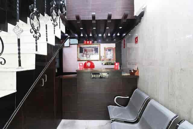 Modern OYO Hotel City Heart reception with sleek design and inviting atmosphere for events.