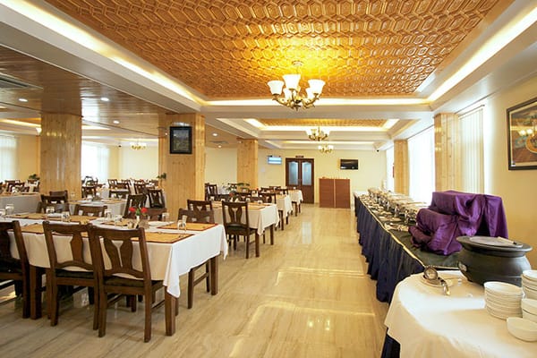 Spacious restaurant in Hotel The Grand Mamta, ideal for events and meetings.