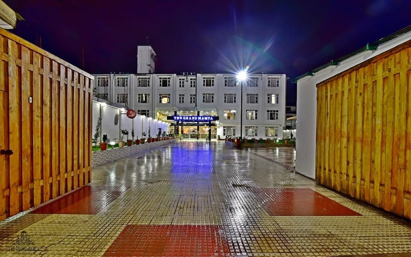 Elegant hotel restaurant entrance in The Grand Mamta, ideal for conferences and events.
