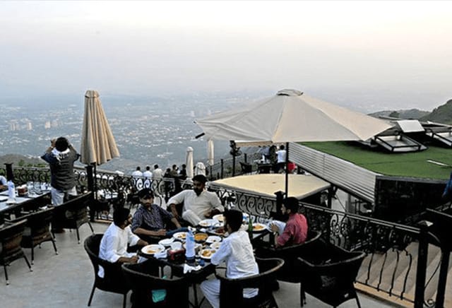 Outdoor terrace dining at The Monal with upscale ambiance for events.