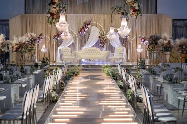 MyLahore Marquee: Elegant wedding venue with floral decor and chic chandeliers.
