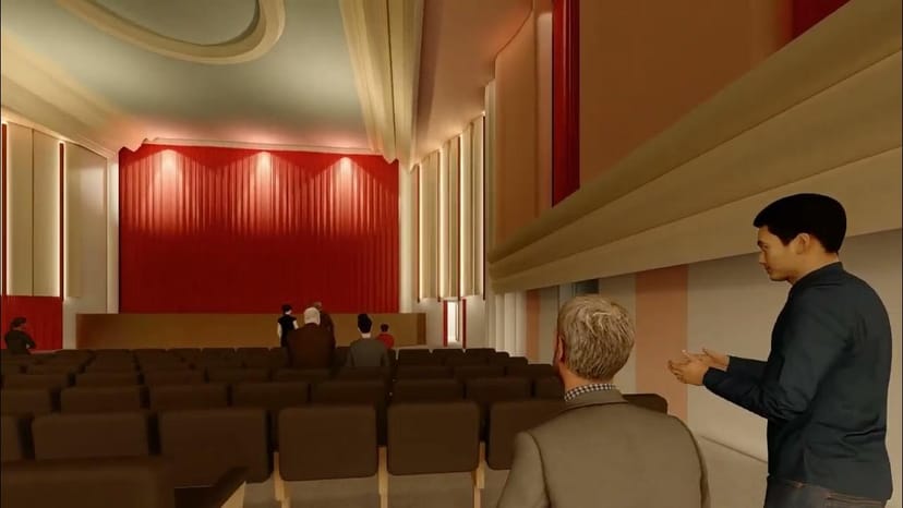 Modern Regal Theatre auditorium, red accents, ideal for conferences and presentations.