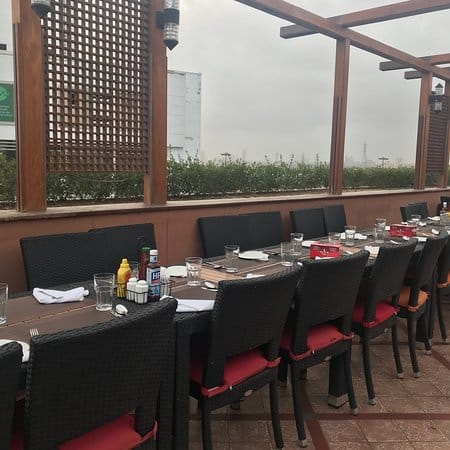 Outdoor dining setup at BBQ Tonight for casual business lunches and networking events.