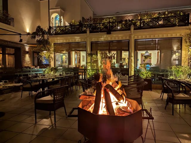 Sultan Boardroom outdoor venue with fire pit for cozy evening gatherings and events.