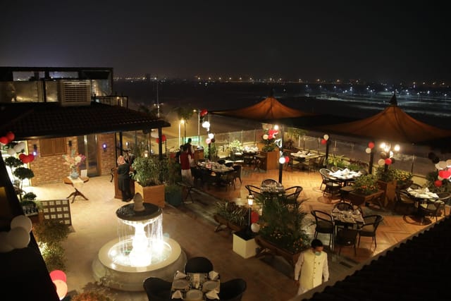 Rooftop restaurant in Spice Bazaar with fountain, ideal for upscale corporate events.